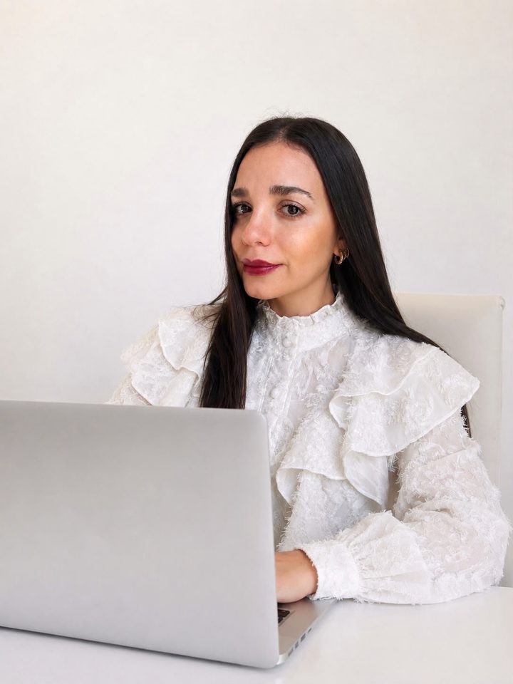Mercedes Balaguer working at her desk.